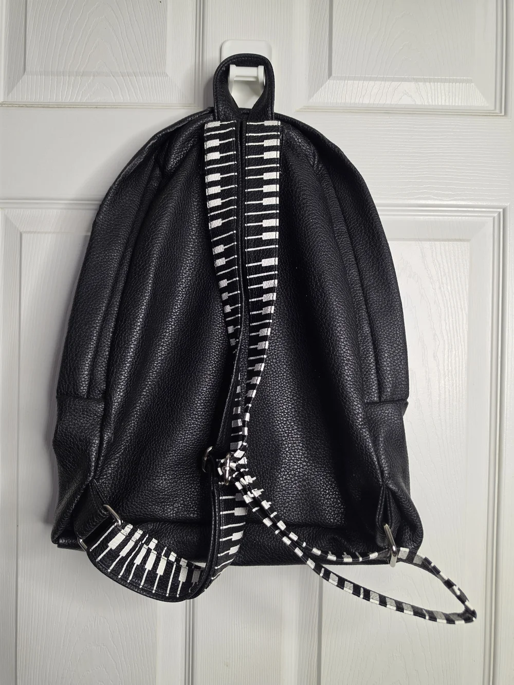 Black Musical Note Backpack with White Piano Detail